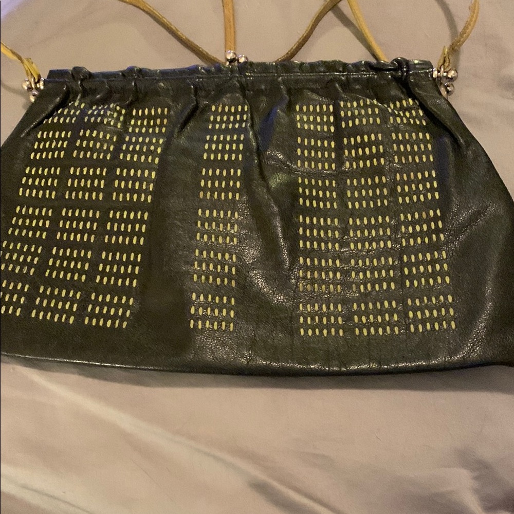 Miu Miu Black with contrast stitching on front.